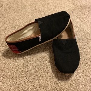 TOMS black with plaid on back and brown trim